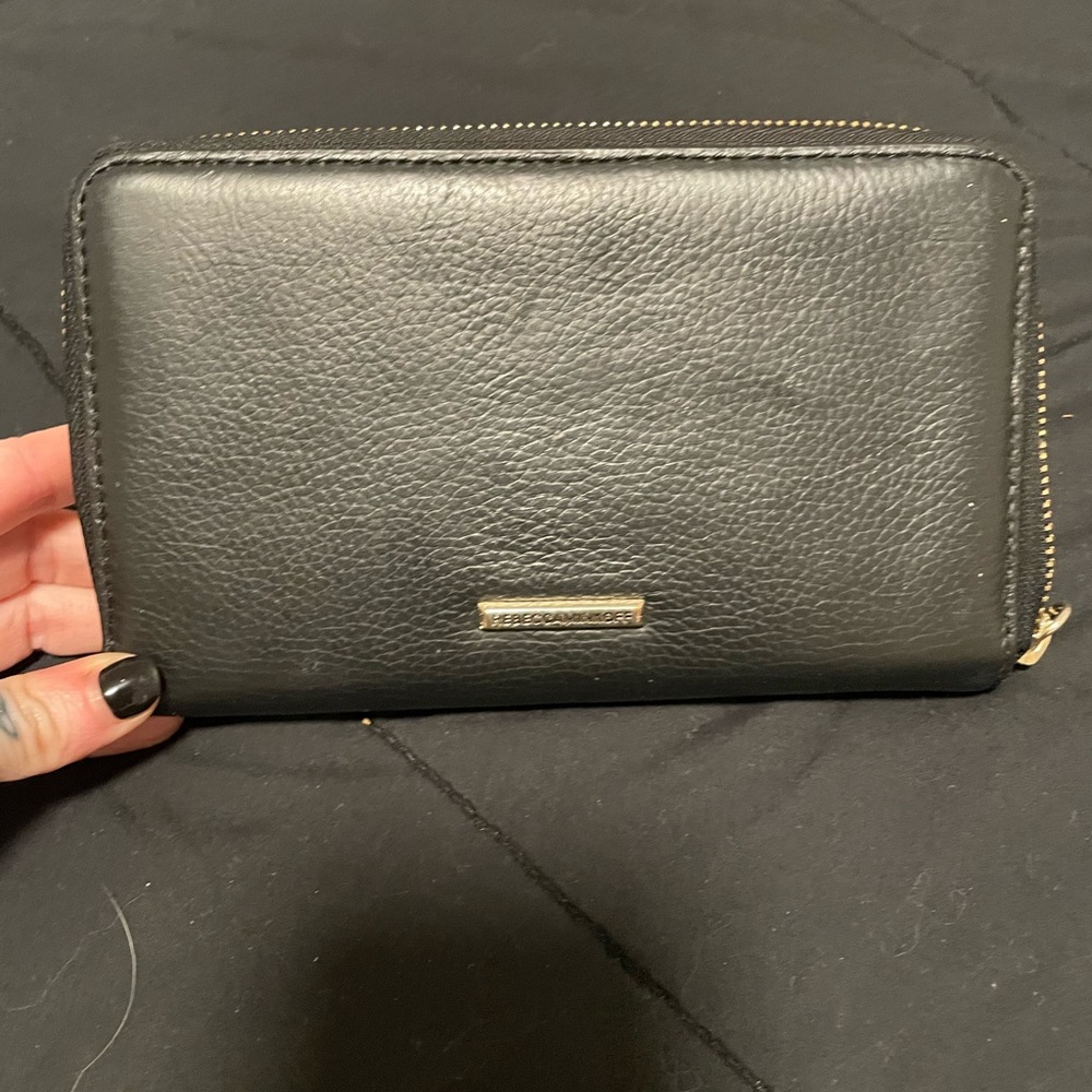 Rebecca Minkoff leather wallet with gold accents.